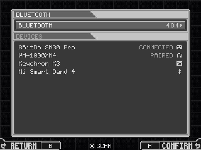 Bluetooth: the radio ON, and DEVICES listing a gamepad (connected), headphones (paired), a keyboard and a smart band